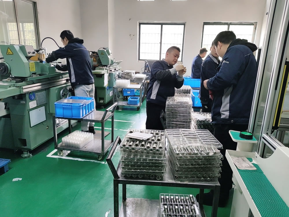 Factory workers assembling products